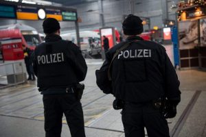 epa05085129 Members of the German police stand in the central railway station in Munich, Germany, 01 January 2015. The terror alert level in the southern German city of Munich remains high, authorities said Friday after a night during which two train stations had to be shuttered amid New Year's festivities because of worries about an attack. Two city train stations - including its central one - were shut down in the final hours of 2015 after police, acting on a foreign intelligence tip, issued a terrorism warning. Details about the exact nature of the threat and the people involved remain unclear. EPA/SVEN HOPPE